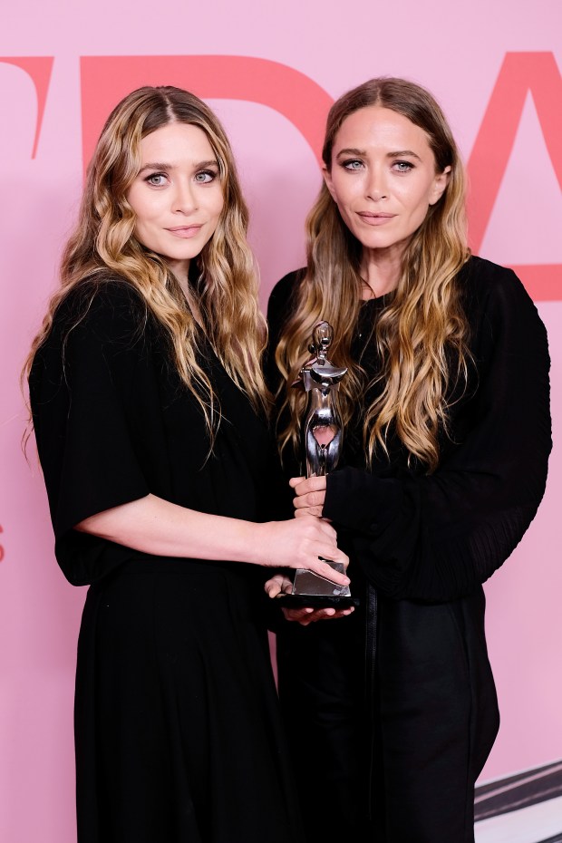 NEW YORK, NEW YORK - JUNE 03: Ashley Olsen and Mary-Kate Olsen pose with Accessory Designer of the Year Award during the Winners Walk during the CFDA Fashion Awards at the Brooklyn Museum of Art on June 03, 2019 in New York City. (Photo by Dimitrios Kambouris/Getty Images)